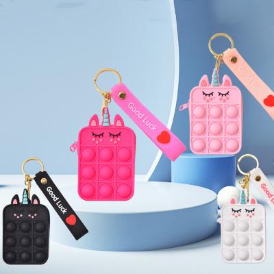 China Squeezable Push Bubble Busy Person Sensory Toys Jumping Silicone Customize Squeeze Toys Stress Reliever Key Chain Colorful Small Bag for sale