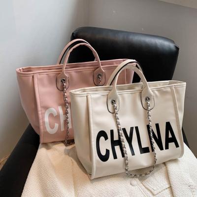 China Fashion Handbags Shape Letters Large Bags Chain Shoulder Bags Fashionable Short Distance Travel Bags for sale