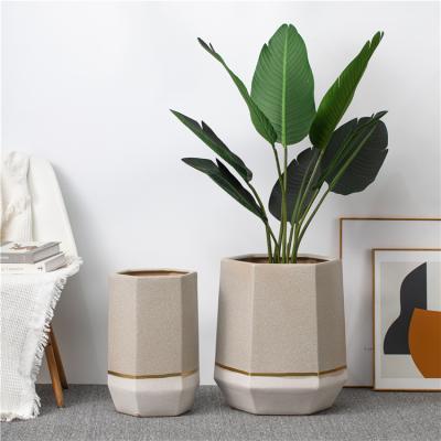 China Eco-friendly creative custom logo decoration gold ceramic planters indoor outdoor pot garden flower pots line for sale