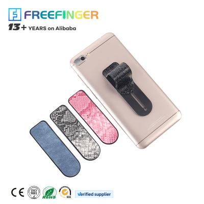 China Hottest Products Adjustable Easy Usability Flexible Slide Finger Grip Strap Mobile Phone Holder for sale