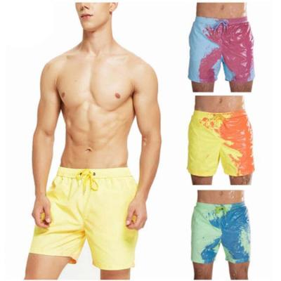 China E-commerce breathable border explosion of water-color swimming trunks beach thermo-sensitive color-changing pants men's shorts for sale