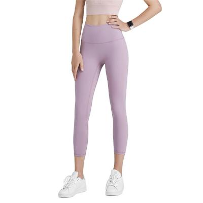 China Breathable Peach Hip Yoga Pants Hot Selling Nudity Feeling No Line Embarrassment Sports Fitness Pants High Waist 7 Point Gaiters for sale