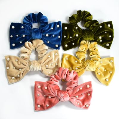 China Fashionable Solid Color Velvet Elastic Hair Tie Custom Fashion Cute Girls Women Bow Pearl Luxury Hair Scrunchies for sale