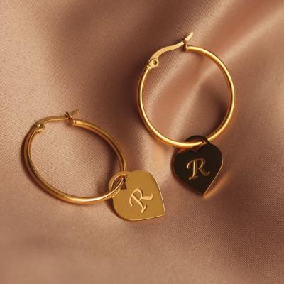 China FASHIONABLE hot sale English initial letter earrings gold plated circle earrings stainless steel earrings for sale