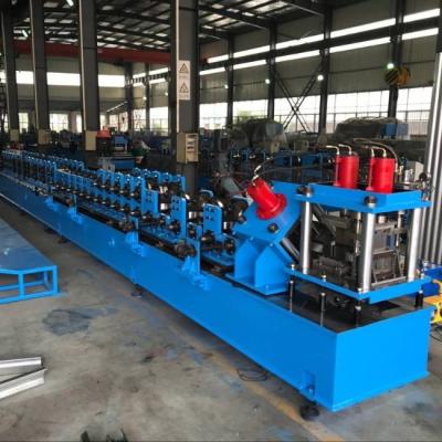 China Hydraulic Cutting Steel Door Frame Roll Forming Machine With Cr12 Roller for sale