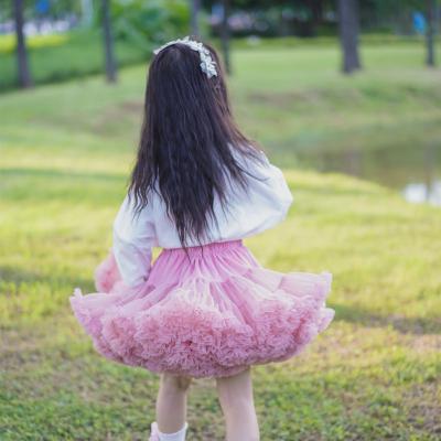 China Polyester fiber (polyester) Amazon hot selling 3-10 years old babies pleated elastic waist solid short skirts pleated skirt girls super fluffy skirt for sale