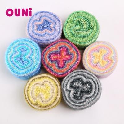 China 50 gram puffy yarn anti-static bulk fancy cake the popular cotton blend acrylic yarn in philippine for sale