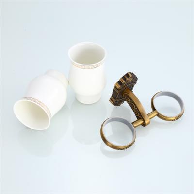 China Viable Wholesale Bathroom Toothbrush Cup Holder Household Couples Toothbrush Antique Double Headed Cup Holder for sale