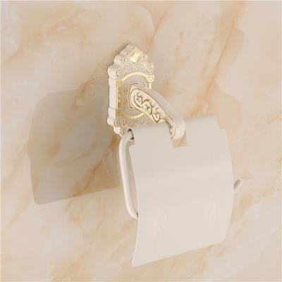 China Modern Customized European Style Metal Paper Roll Holder Gold Pull Toilet Paper Holder New Bathroom Aluminum Ivory White Design for sale