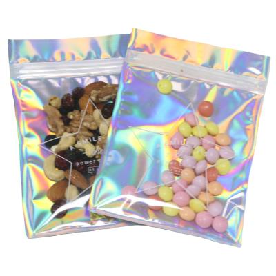 Cina Custom Logo Moisture Proof Printed Reusable Plastic Edible Holographic Mylar Pouch Food Packaging Ziplock Bag 4X6inch Candy For Holiday Party in vendita