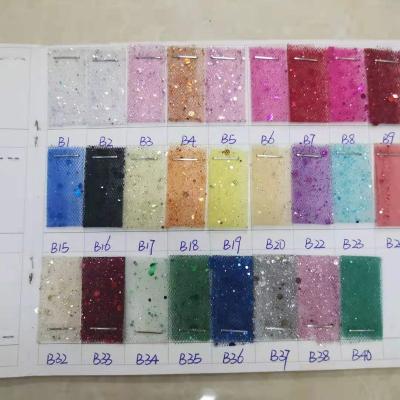 China Viable Factory Wholesale Cheap Price Shiny Glitter Sequin Tulle Lace Fabric for sale