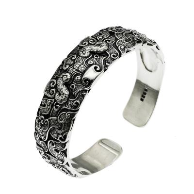 China Vintage 19MM Wide Cuff Bracelets For Men Dragon Carved Ethnic Open Bangle 925 Sterling Silver Buddhism Jewelry for sale