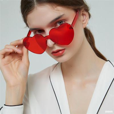 China Long Lasting Color Fun Candy Oversized Shades Love Heart Shaped Rimless Sunglasses for sale