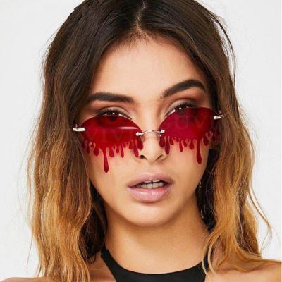 China Hot Selling Unique Luxury Women Shades UV400 Anti Tear Shaped Rimless Sunglasses for sale