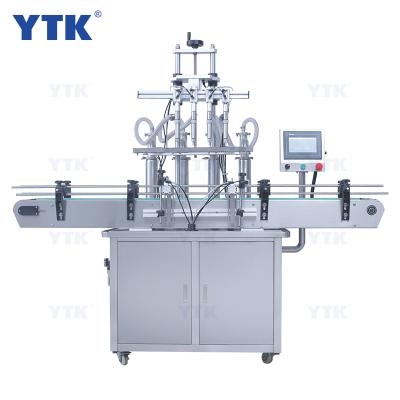 China YTK-ALF4 Food High Efficiency Production Line Fully Automatic 4 Heads Filling Machine Liquid Filling Machine Juice for sale