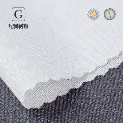 China China supplier high quality fusible water jet woven interlining for ladies garment for sale