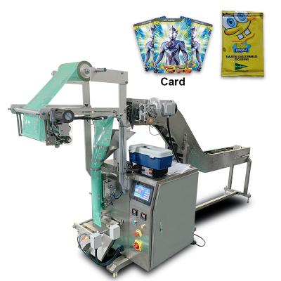 China Semi-automatic Food Card Melon Seeds Biscuit Snacks Packaging Machine Granule Packing Machine for sale