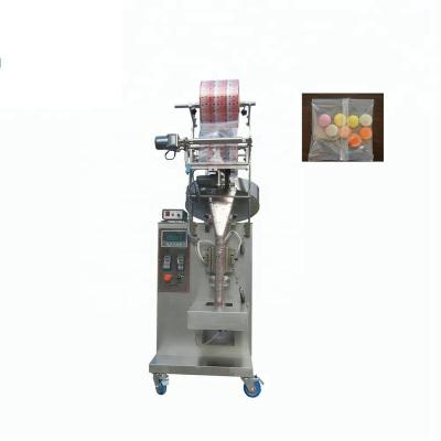 China Multifunctional Food Sealing Tablet Candy Granule Counting Filling Labeling Packaging Machines for sale