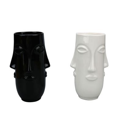 China Creativity Minimalist Nordic White 3D Face Black Simple Design Morden Style Ceramic Vase for Home Decor Hotel and Office Flower Pot for sale