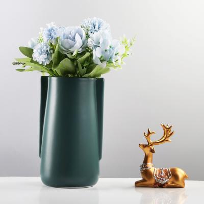 China Nordic simple minimalistic creative colorful ceramic table decoration vase flower living room handmade ornaments for sale