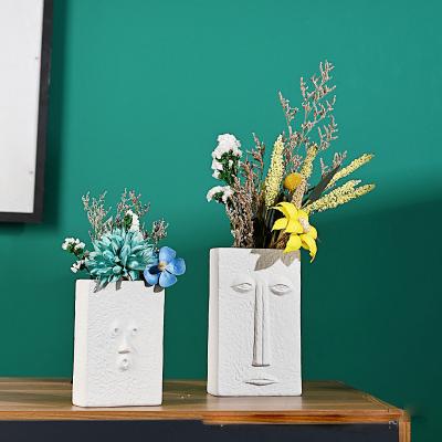 China Modern Decorative Creative White Ceramic Vase Minimalist European Style Porcelain Art Flower Pot Vase Abstract Human Face for Home Decor for sale