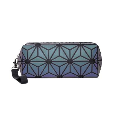 China Durable Fashion Geometric Luminous Cosmetic Bag Clutch Makeup Bag for sale