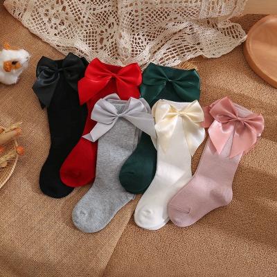 China Autumn Solid Color Kids Socks Viable Bow Mid-Tube Baby Spanish Socks for sale