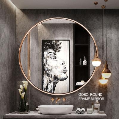 China Contemporary Modern Oval Metal Frame Designer Bathroom Wall Luxury Hotel Round Mirror Decorative Steel Golden for sale