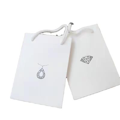 China Custom Fashion Recyclable Your Own Logo Eco Cosmetics Jewelry Garments Bakery Gift Luxury Shopping Paper Bags for sale