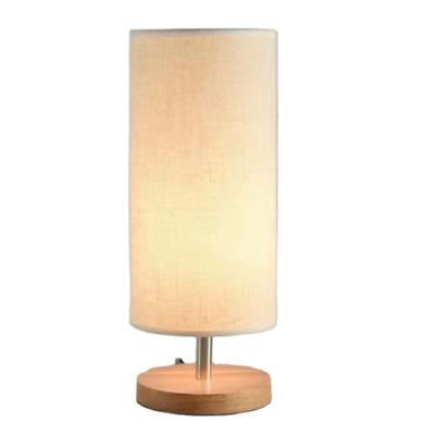 China Modern Nordic solid wood LED fabric table lamp bedroom lamp bedside lamp for sale