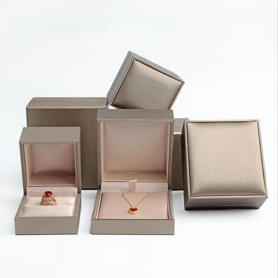 China Newest Luxury Custom Leather Wedding Jewelry Ring Box PU Gift Box Jewelry Packaging for sale