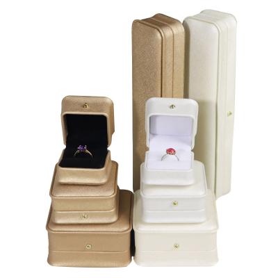 China Newest Gold Color Jewelry Packaging Leather Box Earrings Packaging With Logo OEM Store for sale