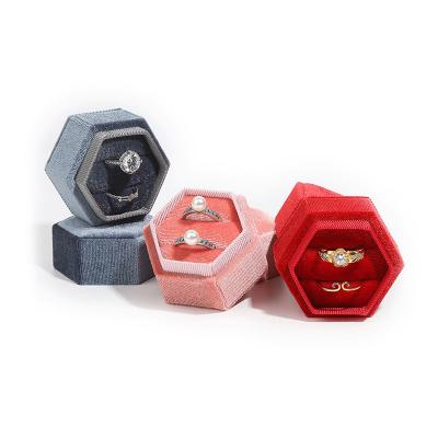 China Newest Creative Jewelry Box Corduroy Jewelry Ring Pile Box Hexagonal Packaging Box Creative Jewelry Box for sale