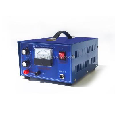 China Jewelry Pulse Welding Machine Spot Welder DX-50A for Gold Silver Platinum Palladiu 500W 50A 110V/220V 35X28X15.5cm for sale