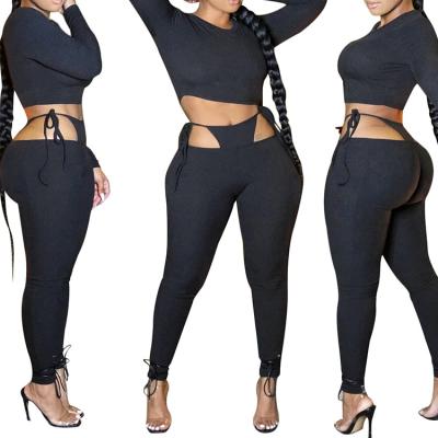 China Anti-Static Women's Sexy Black Hollow Cut Club Wear 2 Piece Sets for sale