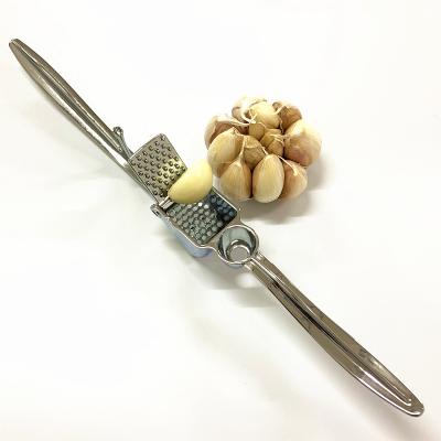 China Kitchen Viable Manual Fruit Juicer Dates Kernel Remover Ginger Crusher Zinc Alloy Red Garlic Press for sale