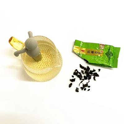 China Viable Creative Viable Tea Silicone Food Grade Doll Shape Infuser Steel Ball Stainless Steel Ball Tea Strainer for sale