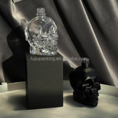 China Customized Essential Oil Skull Shaped Dropper Bottle 30ml 60ml 120ml Clear Glass Oil Dropper Bottle for sale