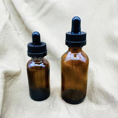 China Custom Essential Oil 1oz 2oz 3oz Small Round Empty Clear Amber Blue Boston Dropper Glass Bottle for sale