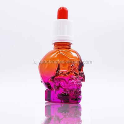 China 1oz essential oil gradient colored skull glass dropper bottle 30ml for ejuice eliquid e cig for sale