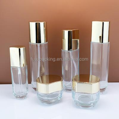 China 30ml 40ml 50ml 80ml 100ml 120ml cosmetic lotion cream glass bottle set with gold/sliver/glack/white cover for sale