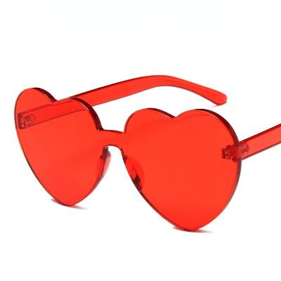 China Fashion Sunglasses Shape Hippie Unisex Plastic One Piece Lens Heart Sunglasses For Women for sale