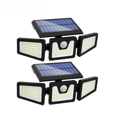 China New Remote Control Power Bank LED Wall Lamp Induction Slot Solar Three Head Lamp Rotating Outdoor Spotlight for sale