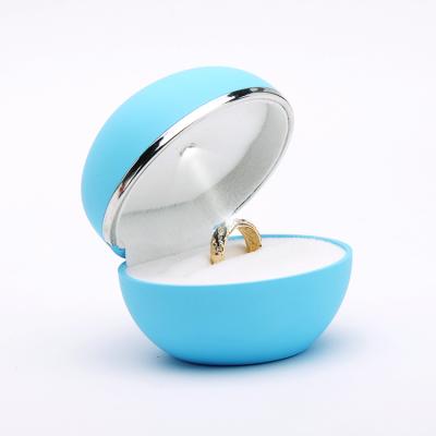 China Attractive Custom Egg Lights Up Velvet Ring Necklace And Bracelet Pendant Set Jewelry Packaging Plastic Boxes With Led Lighting For Gift for sale