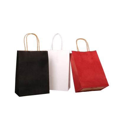 China Recycled materials wholesale small yellow white black cheap custom thank you retail e-commerce business gift packaging kraft paper bags with handle for sale