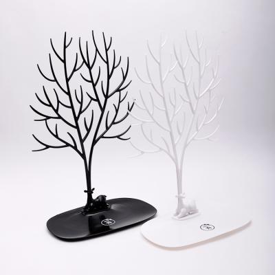 China Morden Fashion Black Forest Deer Tree Shape Stand Earrings Stand Plastic Necklace Ring Jewelry Set Rack Display Beautiful For Store for sale