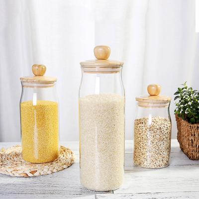 China High Sustainable New Product Food Container Unique Designed Borosilicate Glass Jar With Wooden Lid for sale