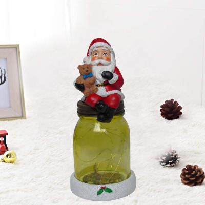 China Santa Claus Home Yard Decoration Xmas LED Table Lamp Resin Santa Led Table Lamp Christmas Resin Christmas for sale