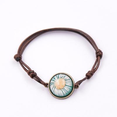 China Handmade Latest Design Vintage Resin Bead Silk Thread Bracelet, Friendship Rope Thread Hand Braided Flower Chain for sale