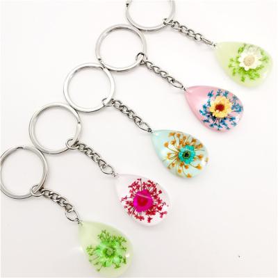 China Promotion Gift Fashion Handmade Luminous Key Chain Dried Flower Locksmith Pink Green Llaveros Para Mujer Women Water Drop Key Ring Bag Je for sale